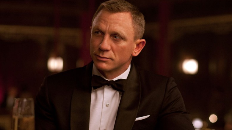 James Bond sits at a bar in "Casino Royale" (2006)