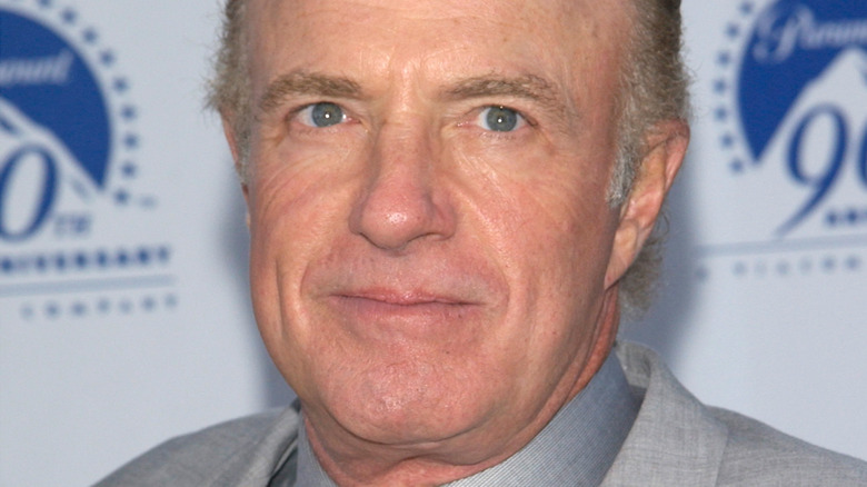 James Caan smirks