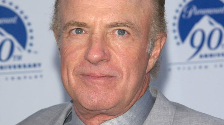 James Caan smirks