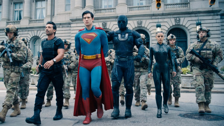 A group of U.S. soldiers, General Rick Flag, Ultra Man, and Engineer arresting Superman