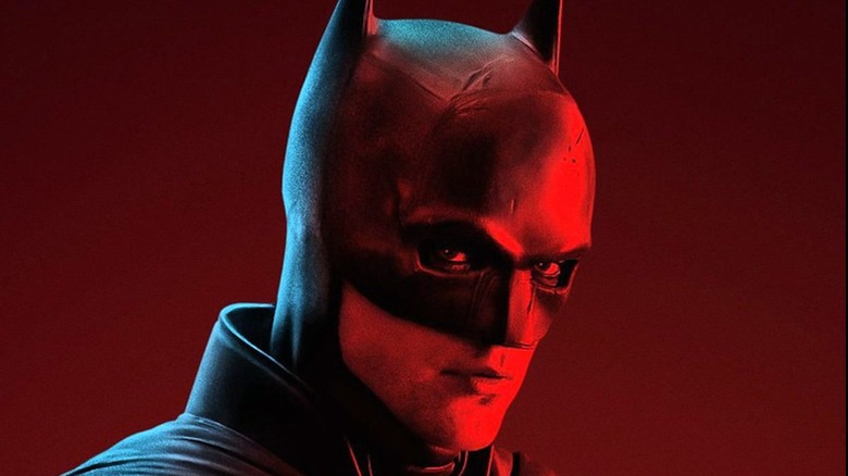 Batman scowling in red light