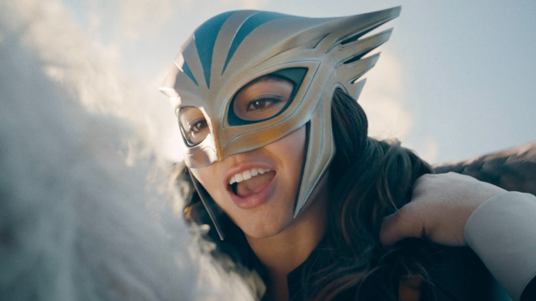 Hawk Girl smirking at the president of Boravia right before dropping him to his death