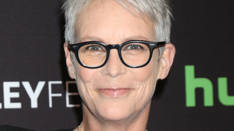 Jamie Lee Curtis smiling in glasses