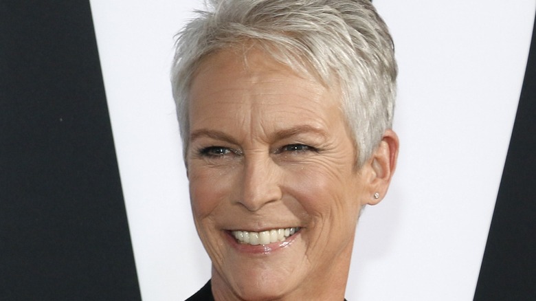 Jamie Lee Curtis smiling black and white background