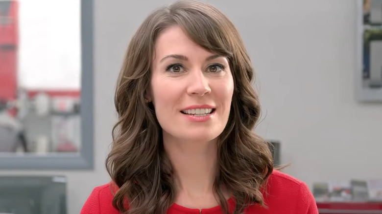 Jan smiles in the Toyota waiting room in a Toyota commercial