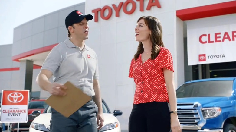 Jan and a delivery driver singing in a Toyota commercial