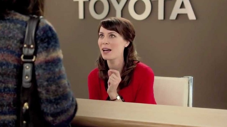 Jan in a roomier red top in a Toyota commercial