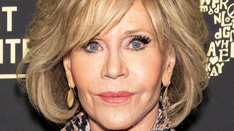 Jane Fonda tight-lipped wide-eyed