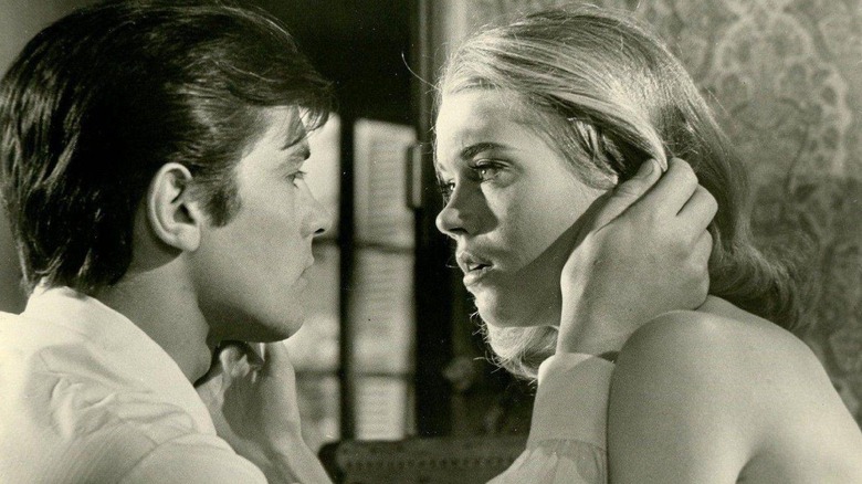 Jane Fonda stares in a mans eyes