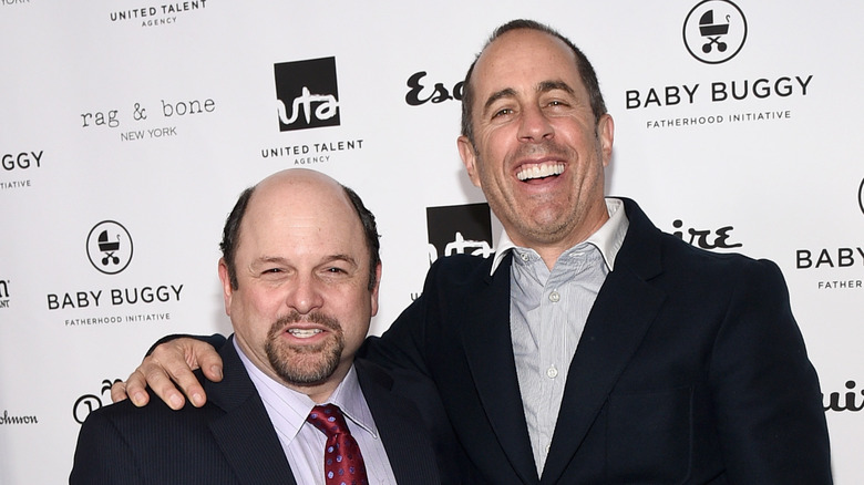 Jason Alexander and Jerry Seinfeld posing for a photo