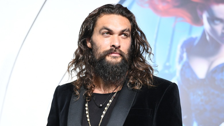 Jason Momoa looking to the side 