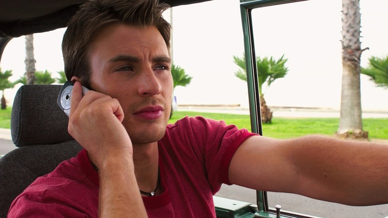 Ryan talks on a cell phone on the bus in Cellular