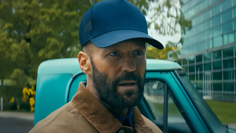 Mr. Clay wearing a baseball cap