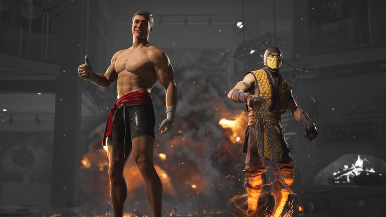 Jean-Claude Van Damme stands next to Scorpion