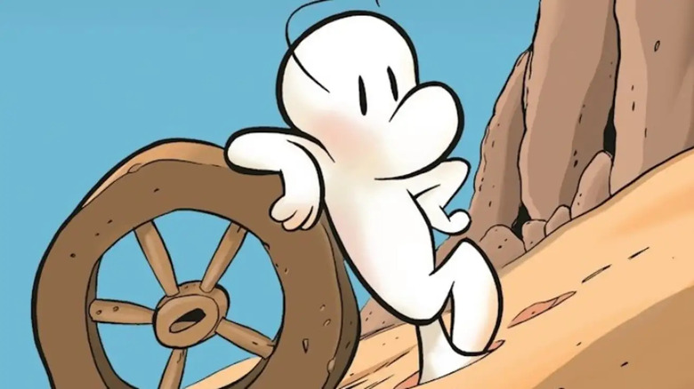 Fone Bone leaning on a wheel
