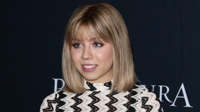 Jennette McCurdy smiling at event