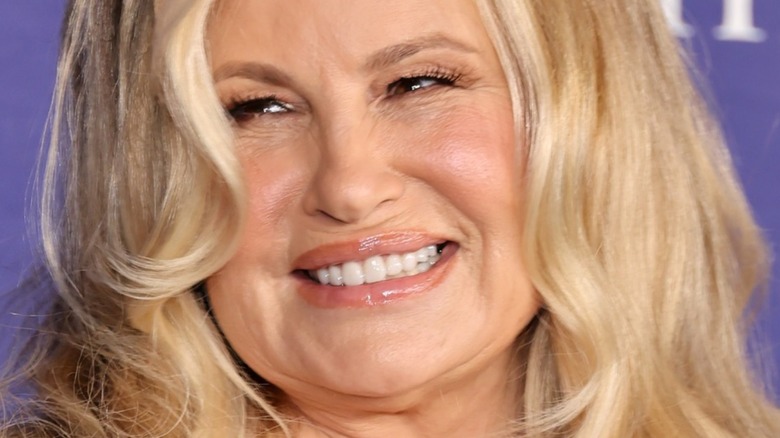 Jennifer Coolidge smiling on red carpet