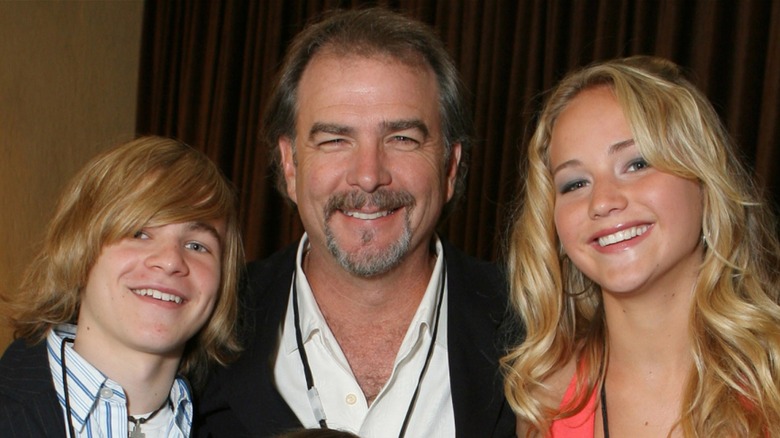 Graham Patrick Martin, Bill Engvall, and Jennifer Lawrence smiling at an event together