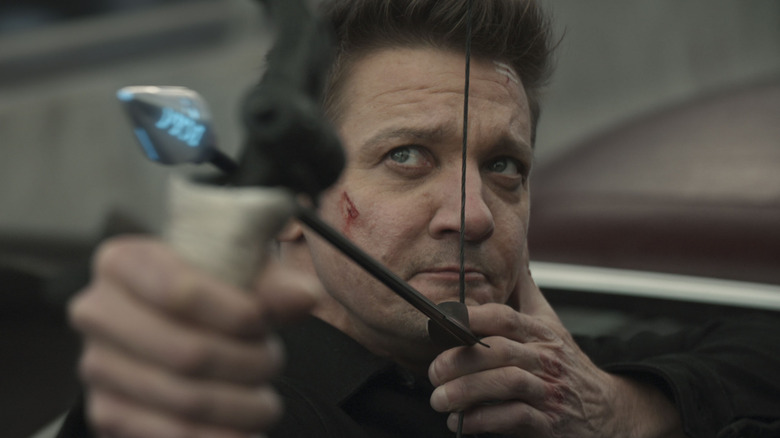 Clint Barton raises a bow and arrow in Hawkeye
