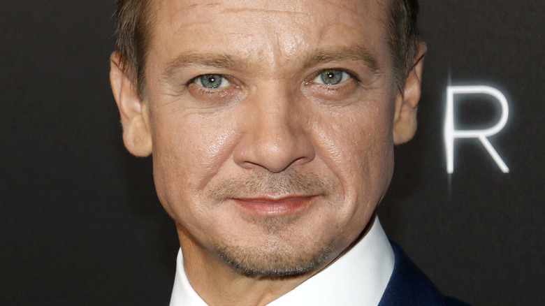 Jeremy Renner looking into camera