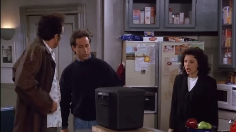 Jerry, Kramer and Elaine investigate strongbox