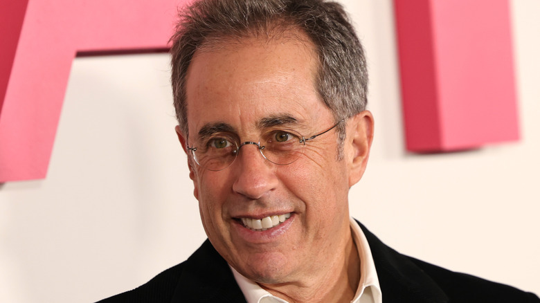 Jerry Seinfeld smiles at a Netflix premiere