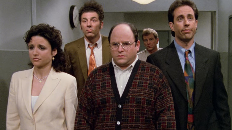 Elaine, Kramer, George, and Jerry walking