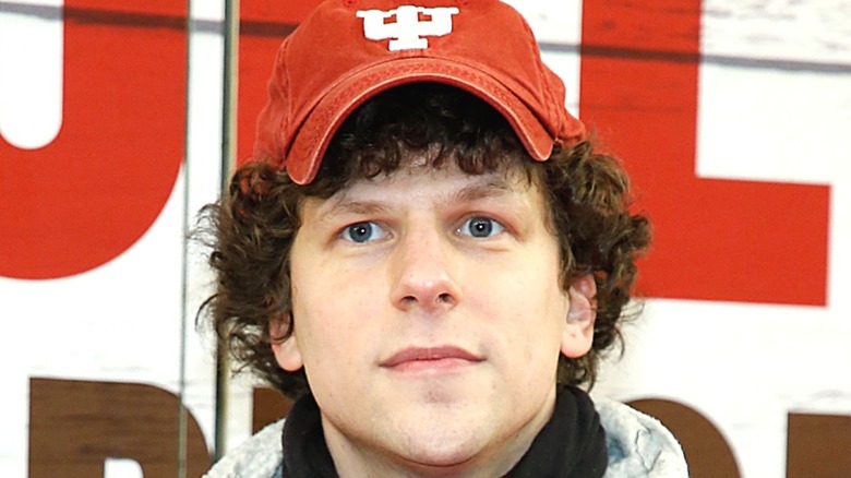 Jesse Eisenberg wearing hat