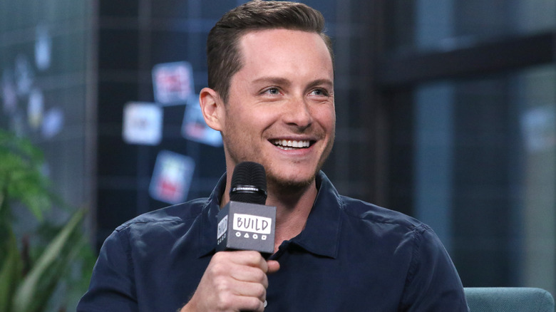 Jesse Lee Soffer talking into microphone 