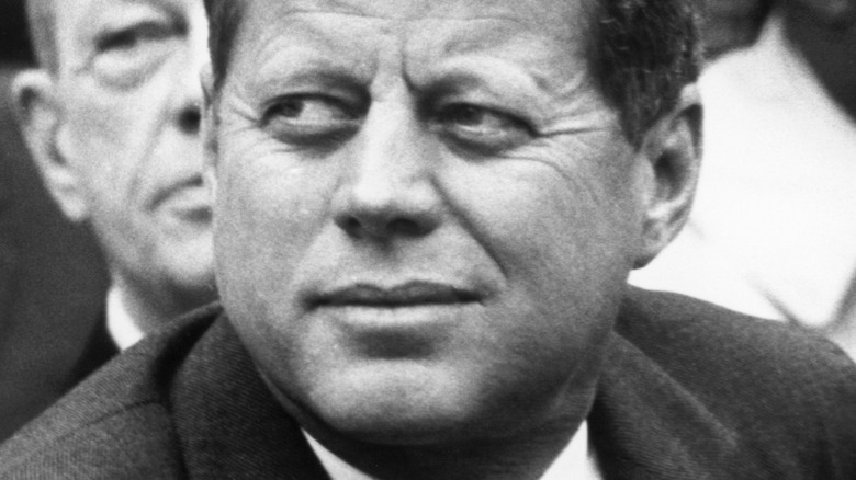 John F. Kennedy looking to the side