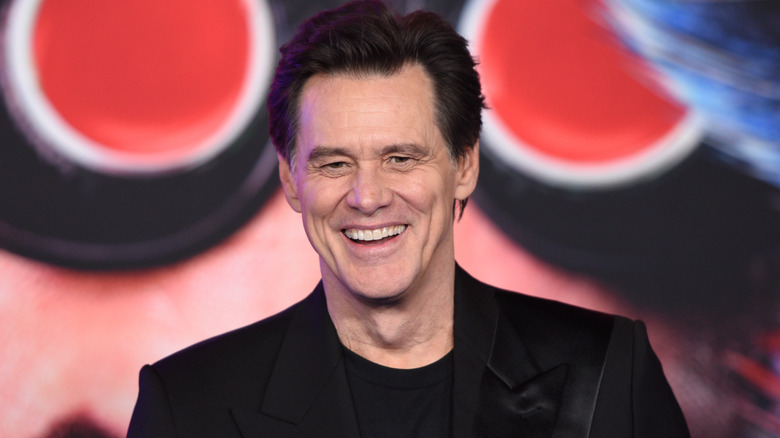 Jim Carrey smiles on stage