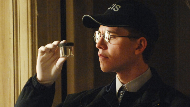 Jimmy Palmer studying something closely