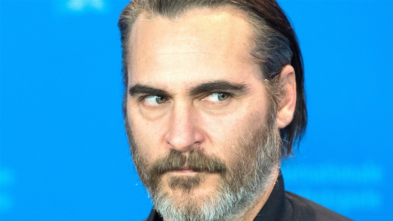 Joaquin Phoenix attends event 