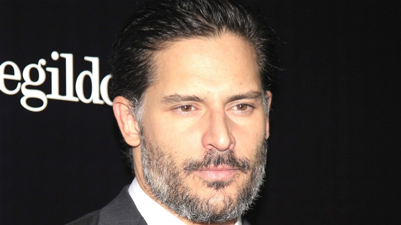 Joe Manganiello gets his picture taken at a premiere