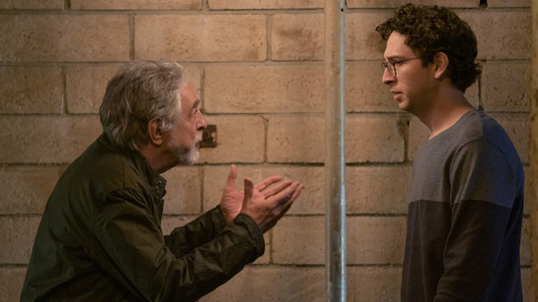 Rick Glassman speaking with his son