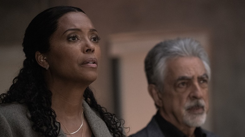 Dr. Lewis and Rossi looking in shock