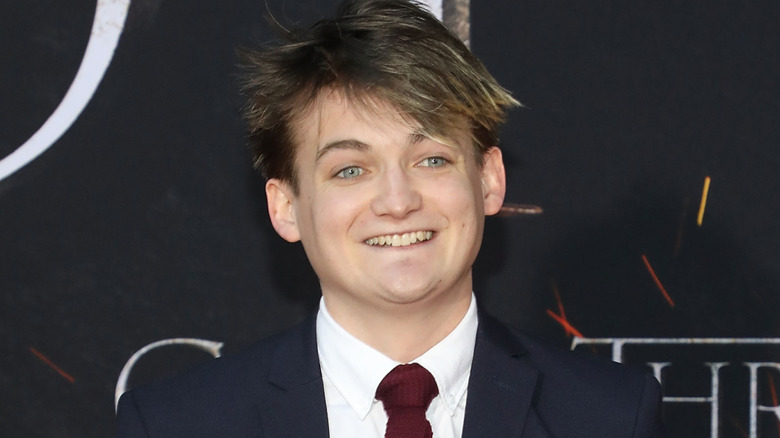Jack Gleeson smiles cordially