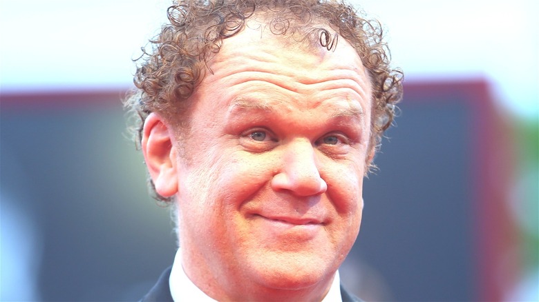 John C. Reilly smiling