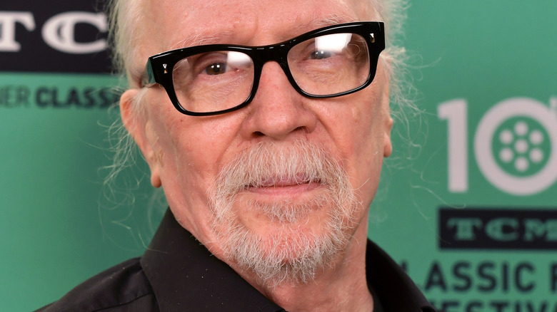 John Carpenter wearing glasses 