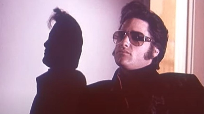 Elvis wearing sunglasses