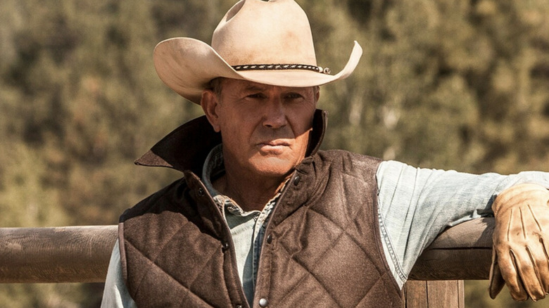 John Dutton leans on a fence post on Yellowstone (2018-2024)