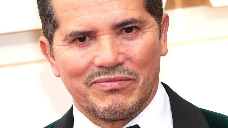 John Leguizamo smiling in tuxedo