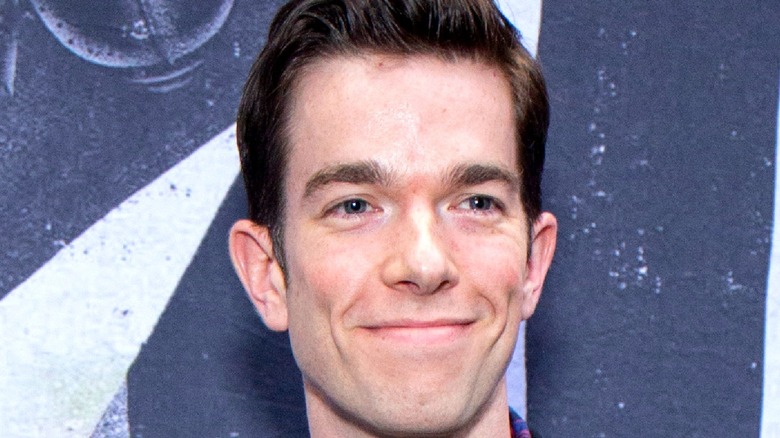 John Mulaney smiling 