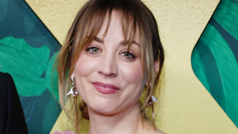 Kaley Cuoco smirking