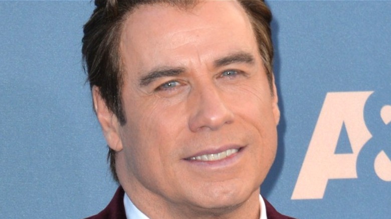 Travolta poses at event 