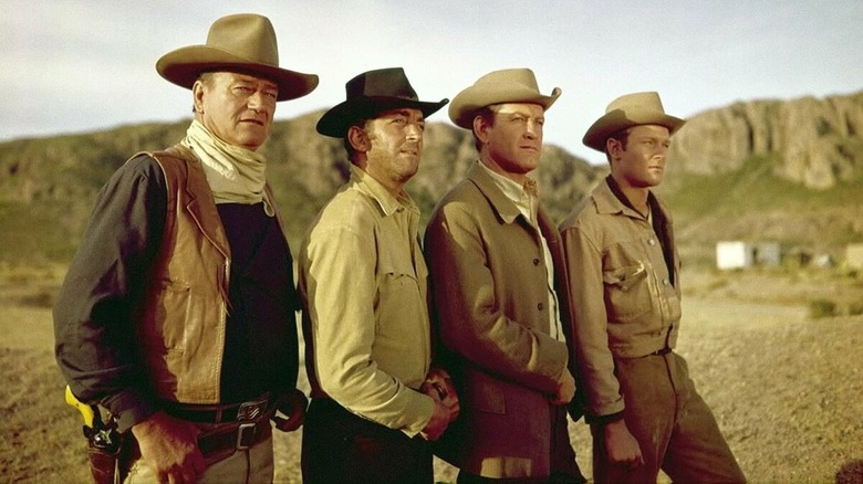 John, Tom, Matt, and Bud standing together in "The Sons of Katie Elder."