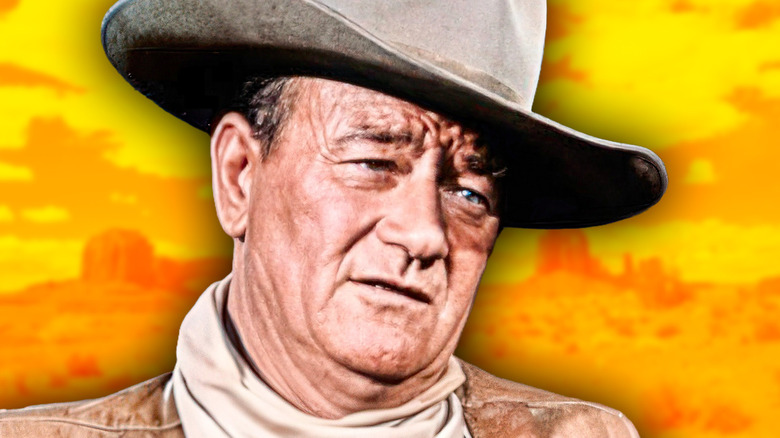 John Elder in front of orange desert background