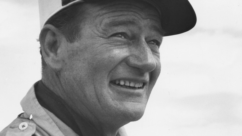 John Wayne smiles