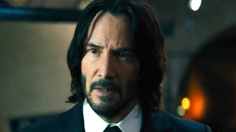 John Wick with a serious expression