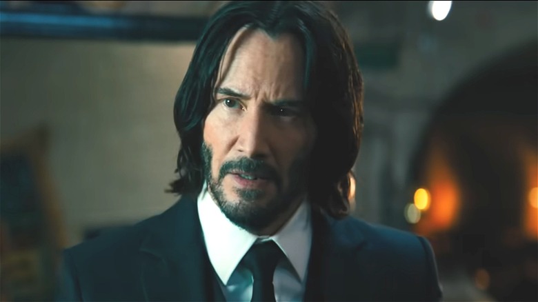 John Wick wearing a suit